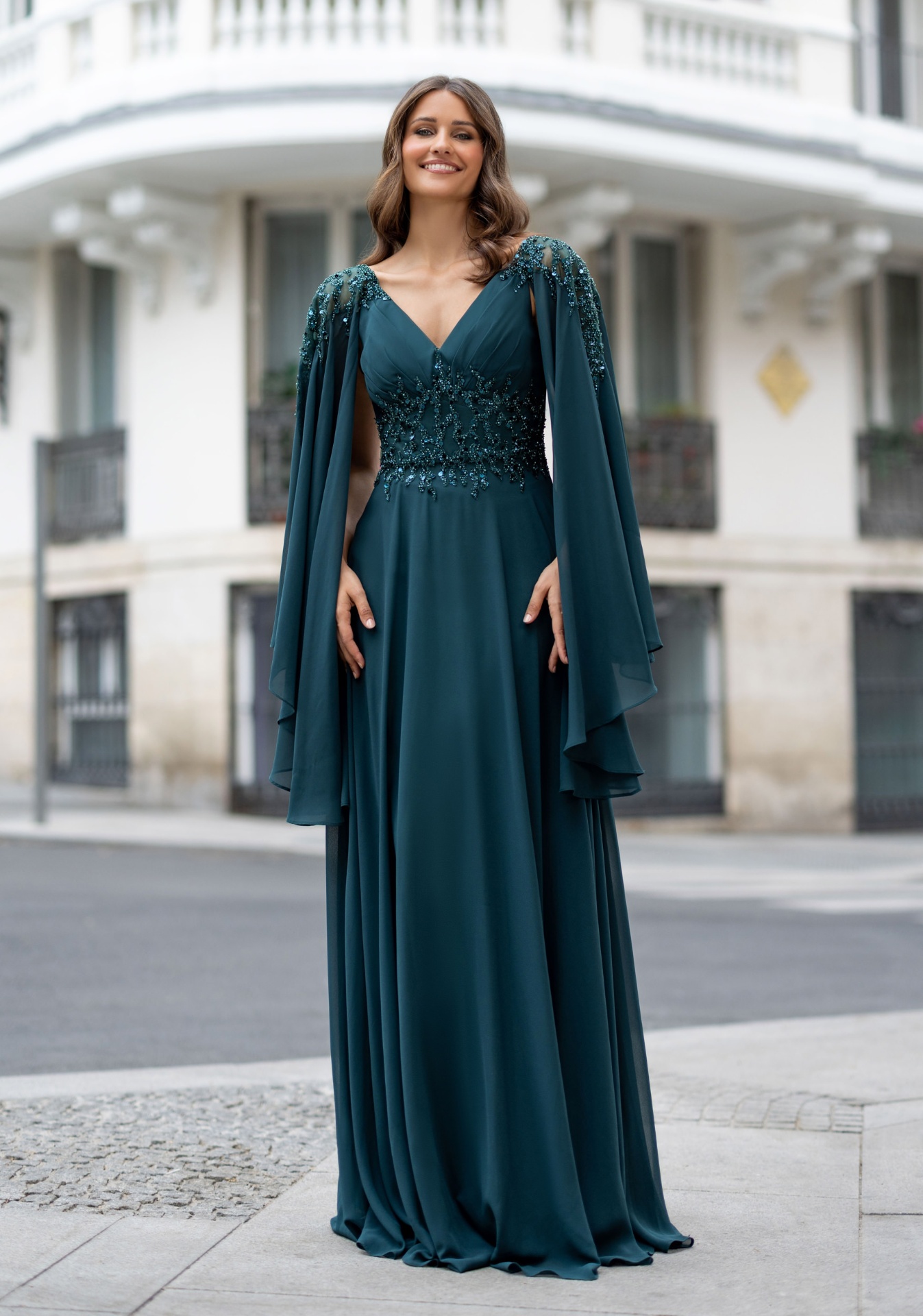 Woman wearing Style 1099 Botanical Green evening dress