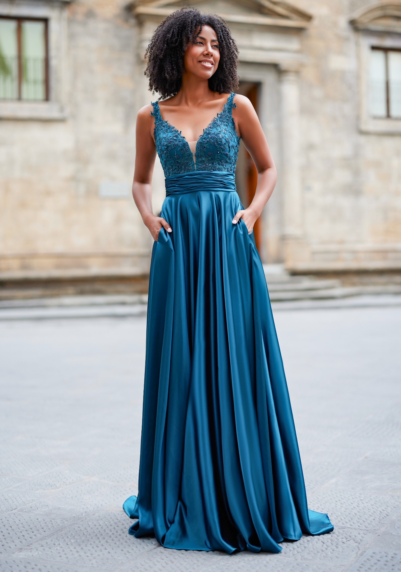 Woman wearing Style 0973 Shining Peacock Green evening dress